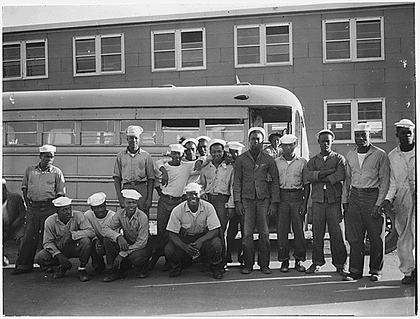 Sailors waiting to board a bus